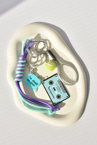 آویز کیف چارم تنیس و نوار کاست