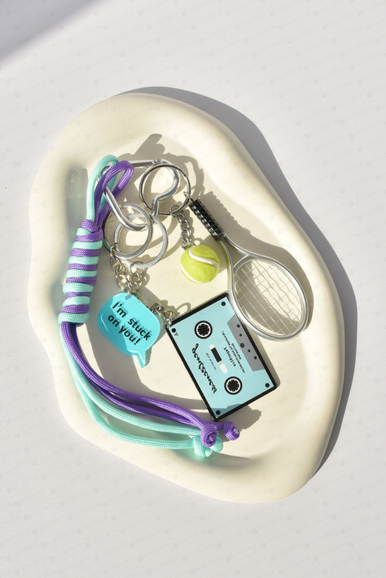 آویز کیف چارم تنیس و نوار کاست